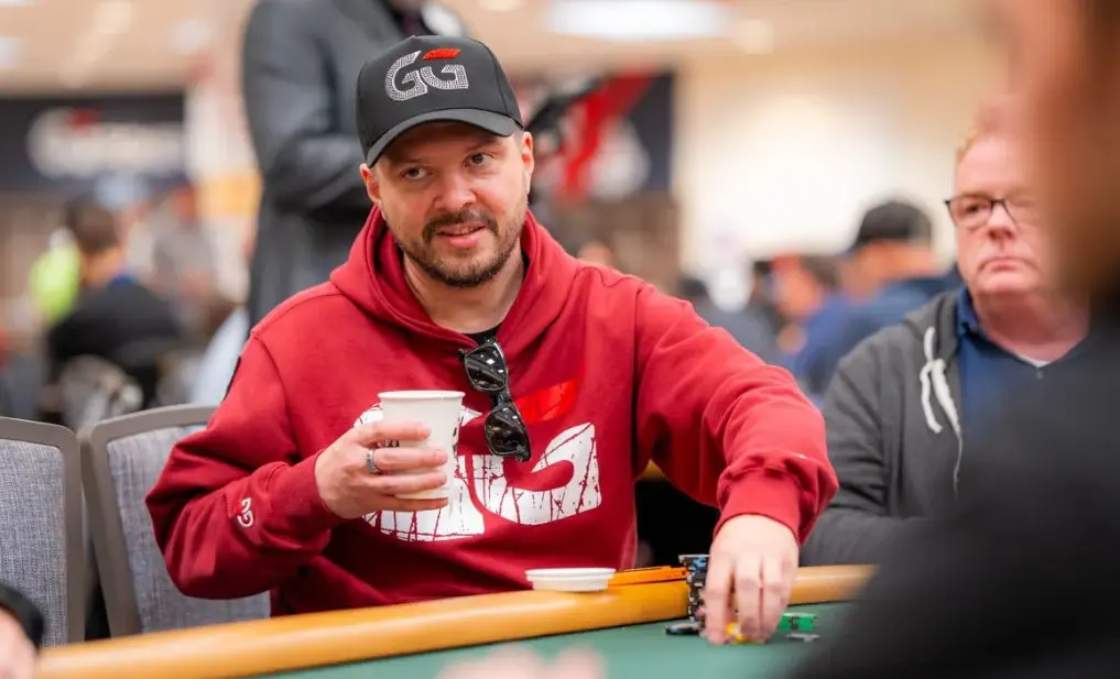 Denys at a live poker table